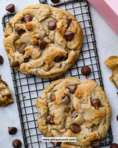 Delicious Crumble Cookies with chocolate chips and nuts on a plate.
