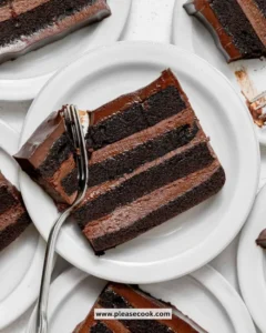 Delicious dark chocolate mousse cake topped with chocolate shavings