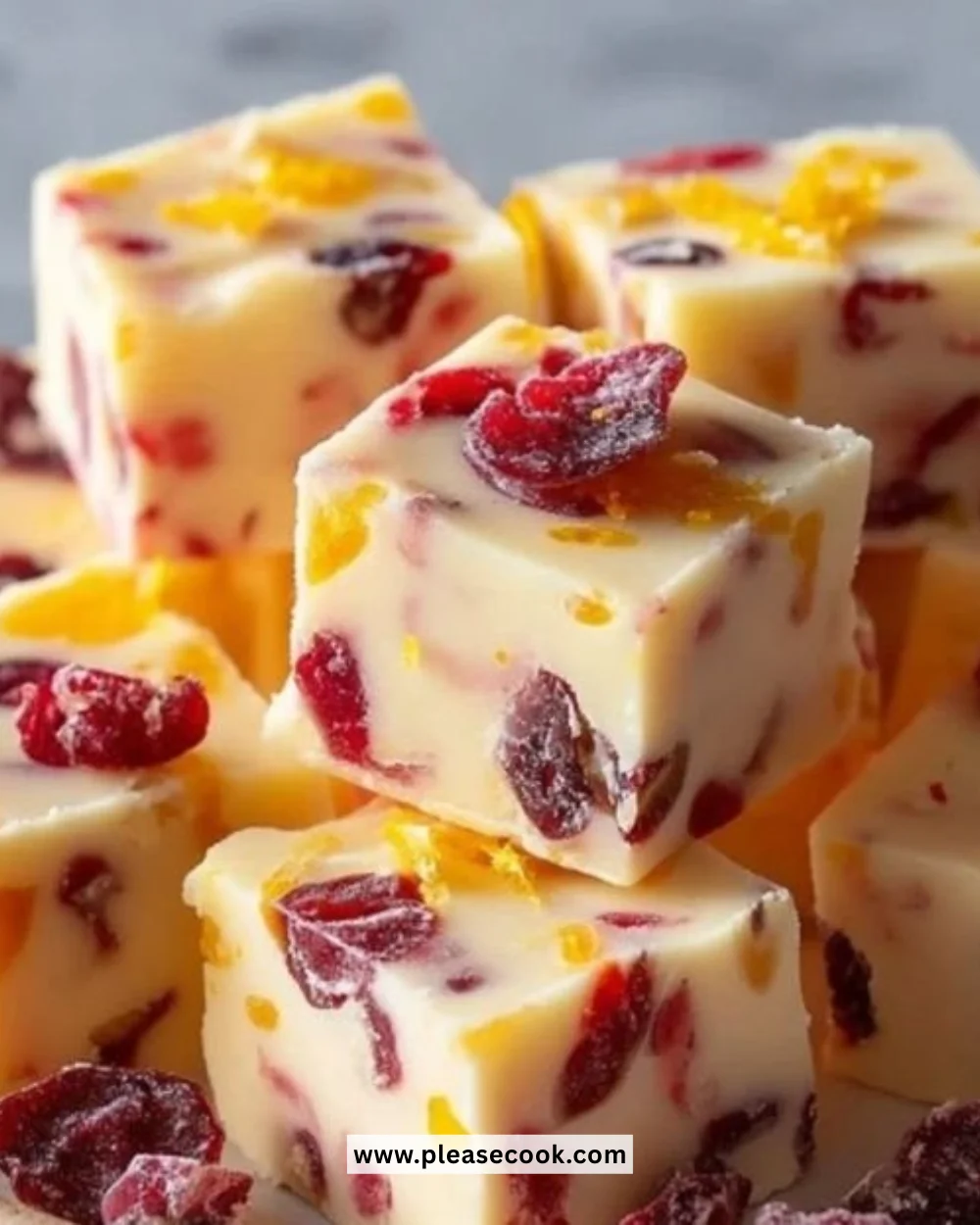 Deliciously easy homemade cranberry orange fudge with vibrant holiday colors