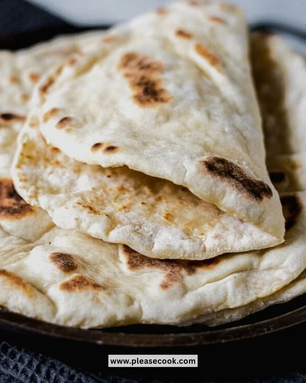 Easy yeast-free Naan bread fresh out of the oven, ready to enjoy.