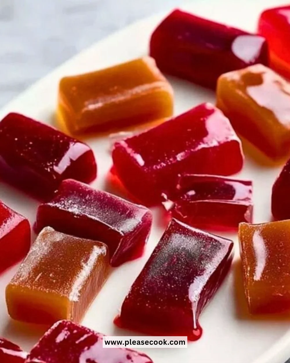 Colorful fruit caramels arranged on a decorative plate