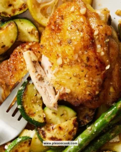 Delicious Garlicky Greek Chicken served with fresh herbs and lemon