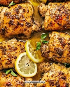Greek Lemon Chicken dish garnished with herbs and lemon slices