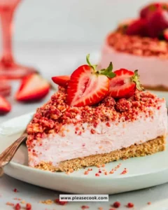 Delicious no-bake strawberry cheesecake garnished with fresh strawberries