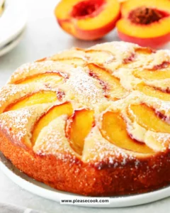 Homemade peach cake with fresh peaches and cream frosting