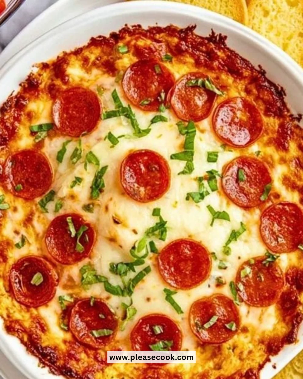 Delicious cheesy pizza dip served with tortilla chips