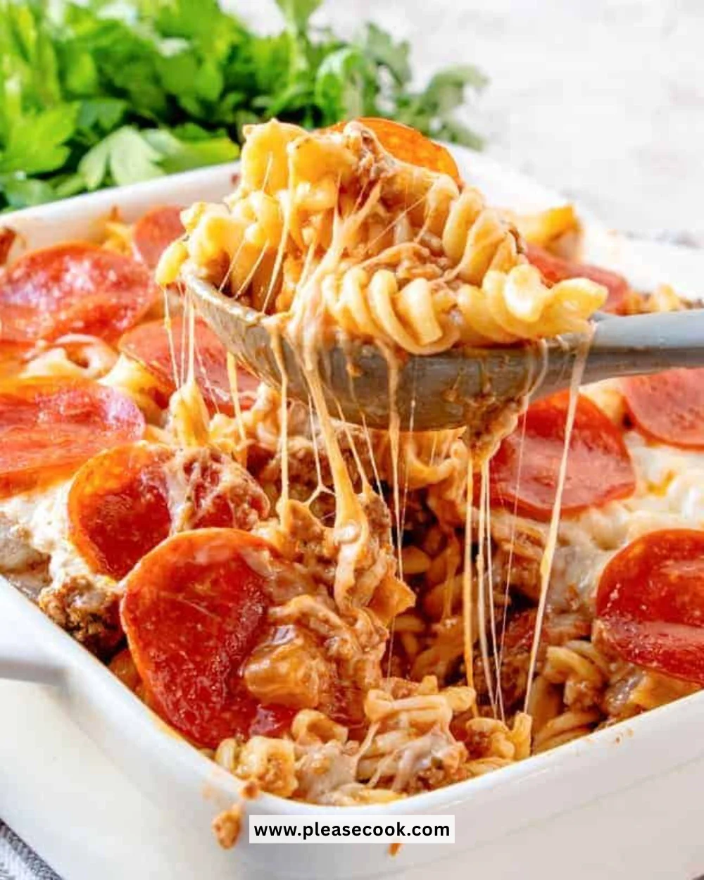 Cheesy and hearty Pizza Pasta Bake in a baking dish