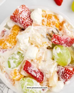 Delicious pudding fruit salad with mixed fresh fruits and creamy pudding