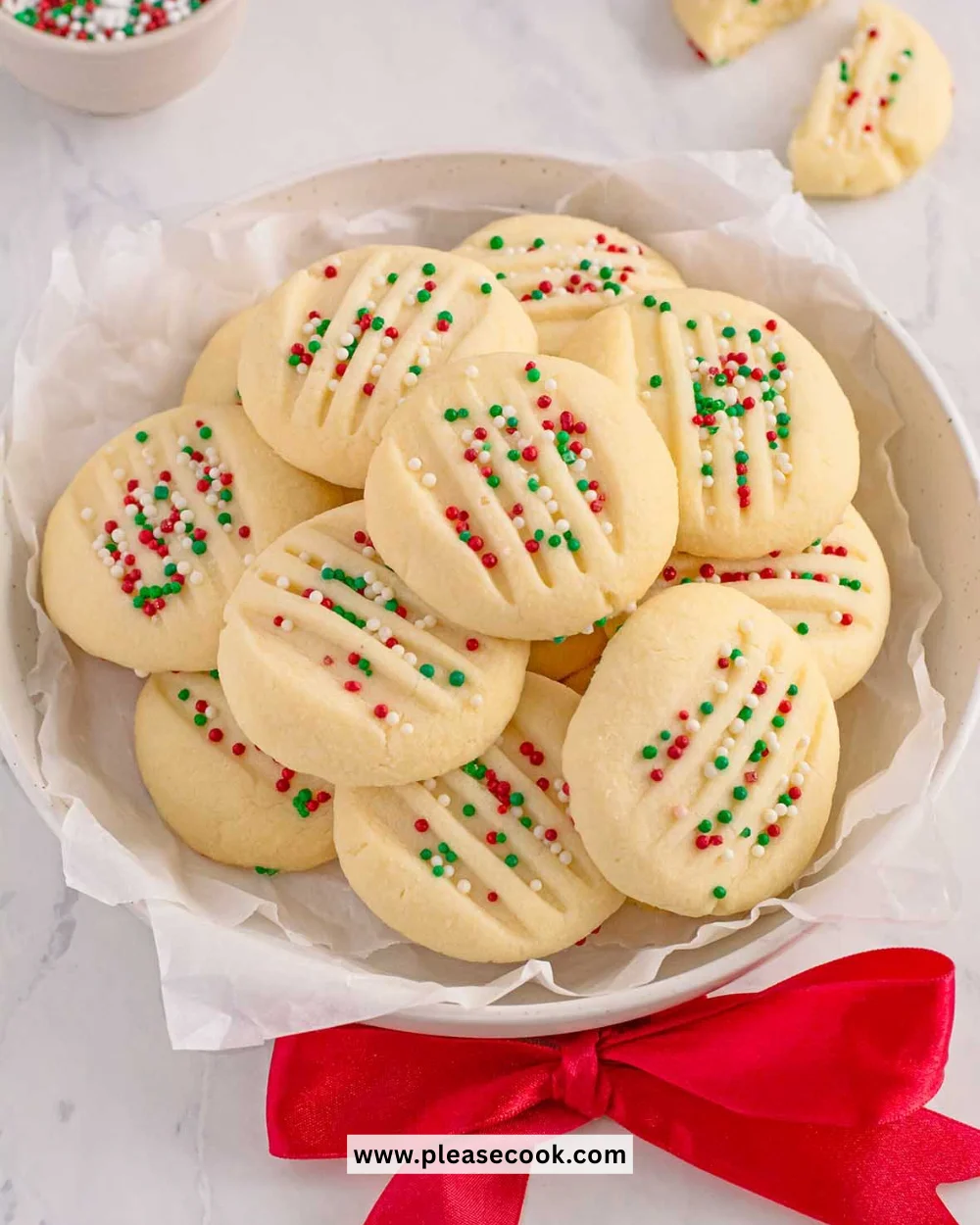 Freshly baked shortbread cookies on a baking sheet