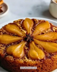 Delicious spiced pear upside down cake with warm spices and caramelized pears