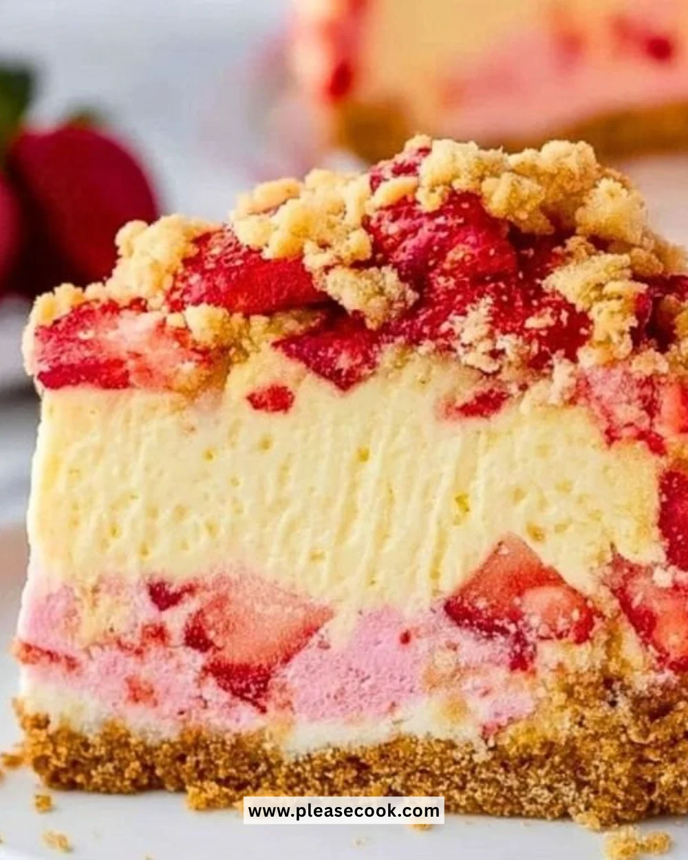 Slice of Strawberry Cheesecake Crunch topped with fresh strawberries and graham cracker crust