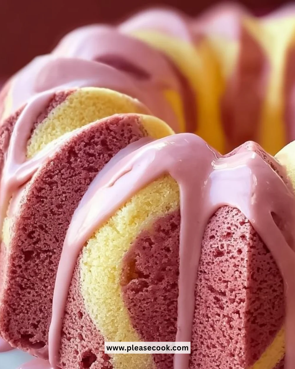 Delicious slice of Strawberry Milkshake Pound Cake with a creamy topping