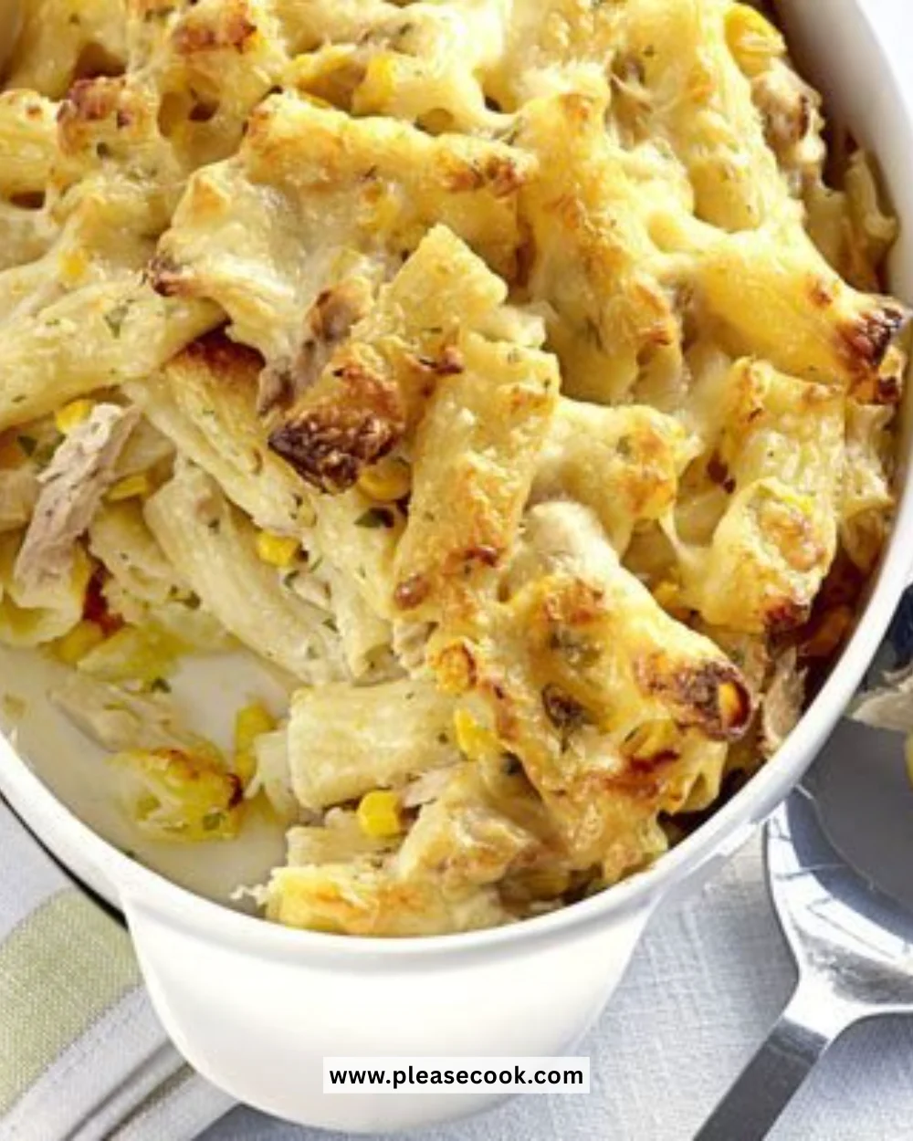 Delicious Tuna Pasta Bake served in a casserole dish with melted cheese on top