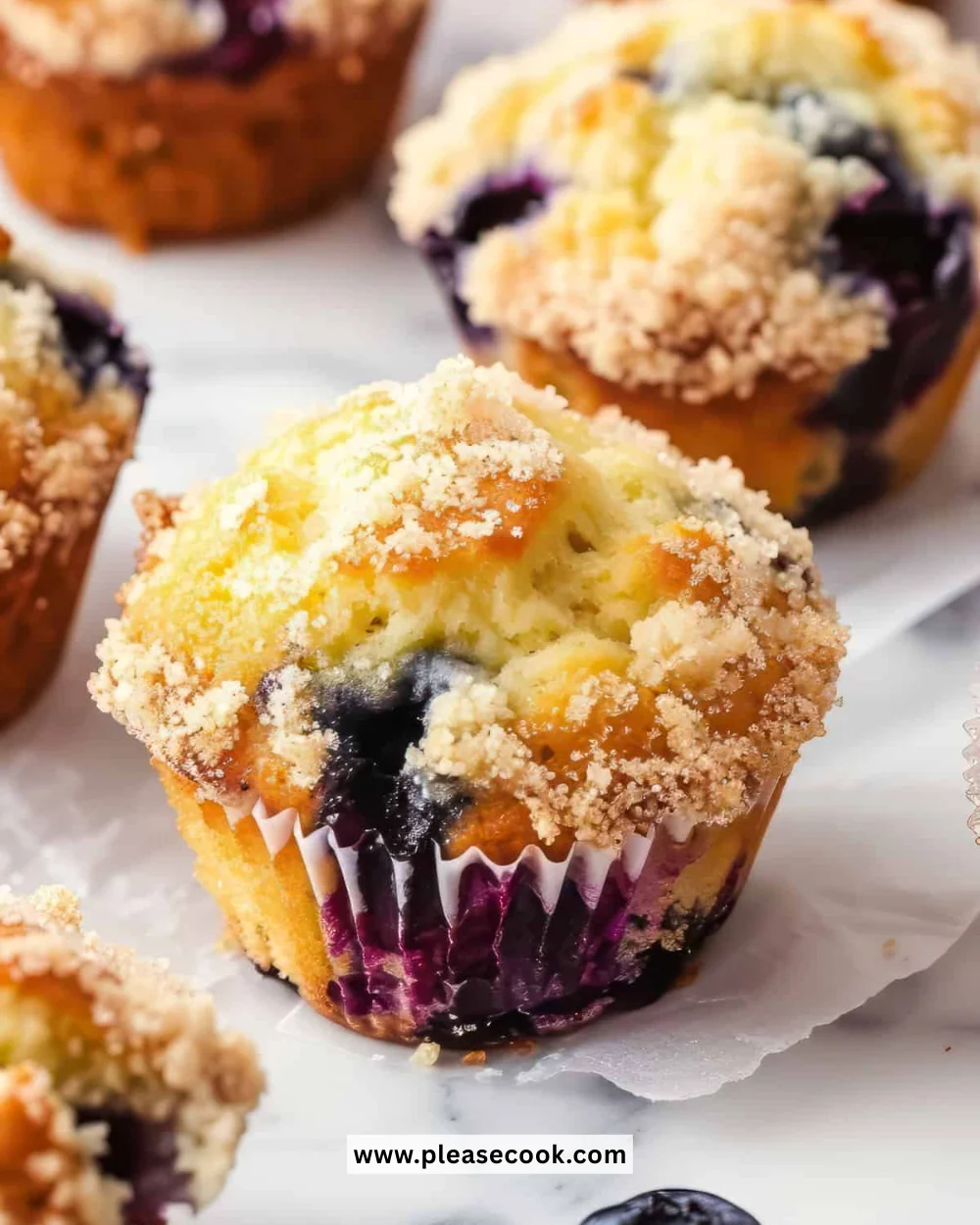 Moist and flavorful blueberry muffins fresh out of the oven