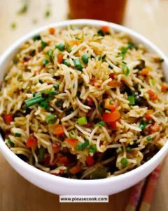 Bowl of colorful Vegetable Fried Rice with mixed vegetables and herbs