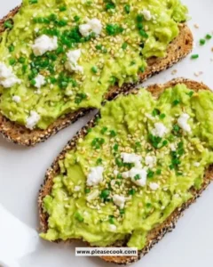Delicious avocado toast topped with everything for a gourmet brunch experience.