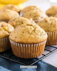 Freshly baked banana bread muffins with a golden brown top