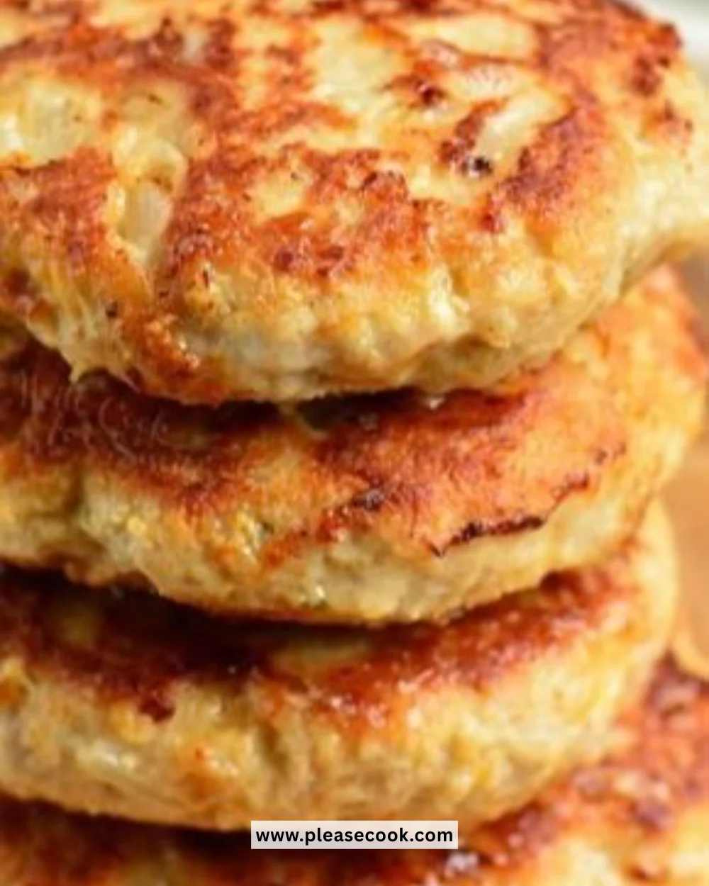 Delicious Cheddar Ranch Chicken Burgers served on a plate with fresh toppings