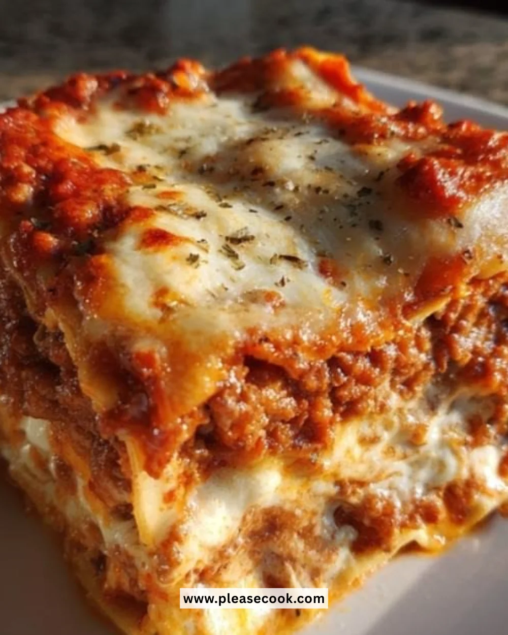 A delicious classic beef lasagna with layers of pasta, sauce, and cheese.