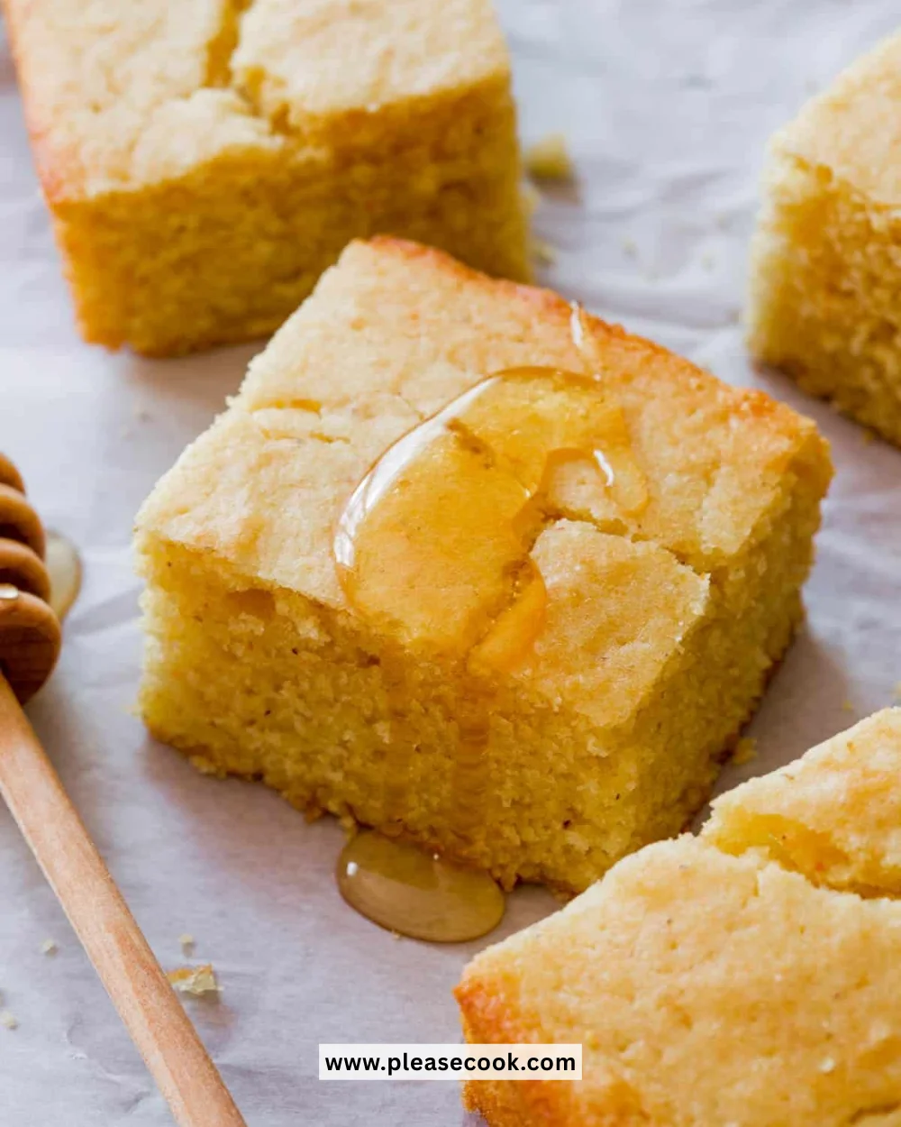 Golden brown slices of homemade cornbread on a plate