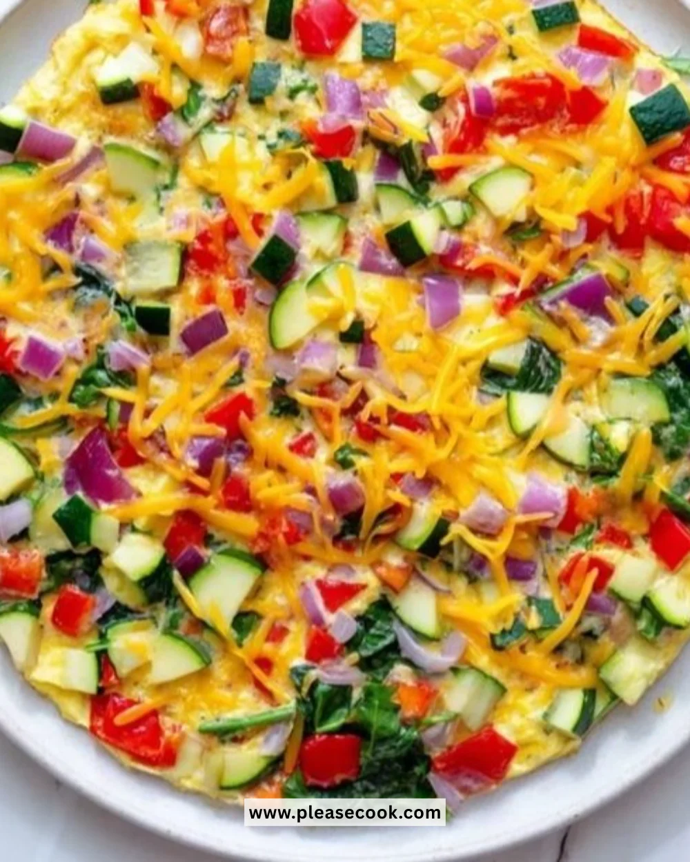 Egg and veggie sheet pan meal with colorful vegetables and baked eggs