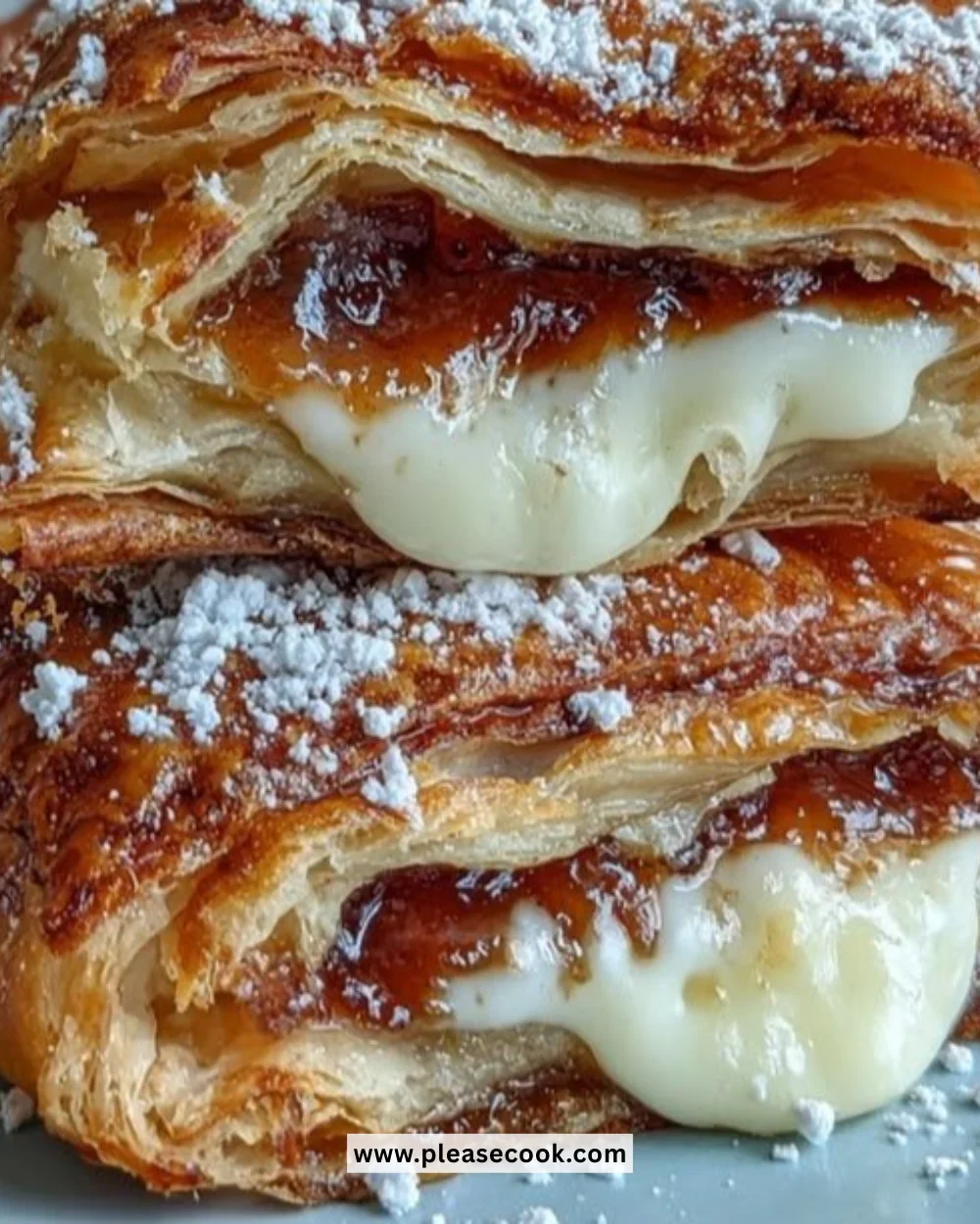 Golden guava cheese pastries on a plate, highlighting their flaky crust and creamy filling