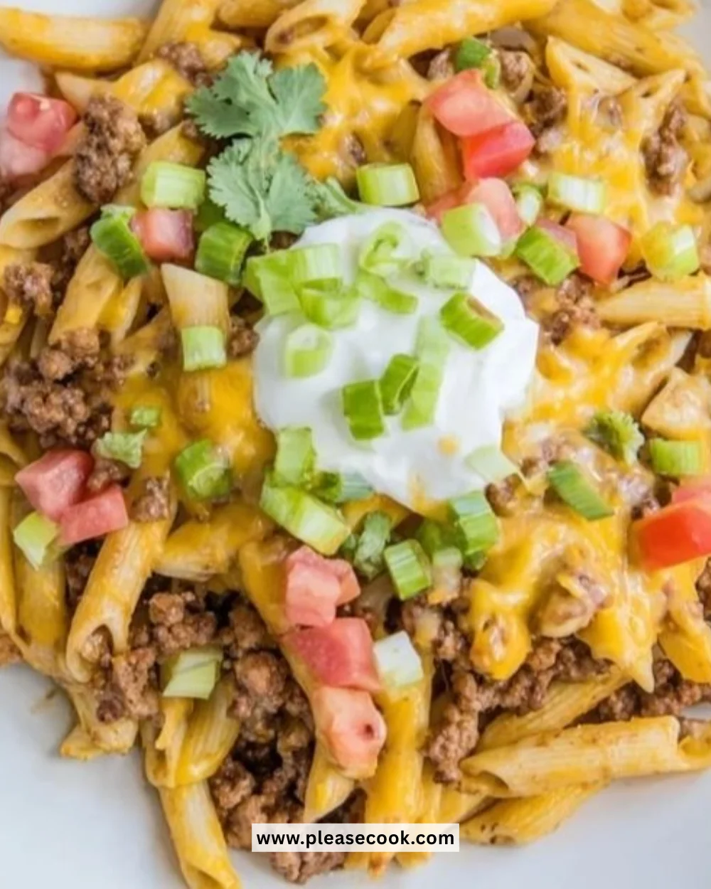 Hearty One-Pot Taco Pasta dish with colorful ingredients served in a bowl.