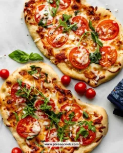 Homemade flatbread pizza topped with fresh ingredients