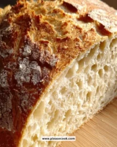 Freshly baked homemade Italian bread on a wooden table