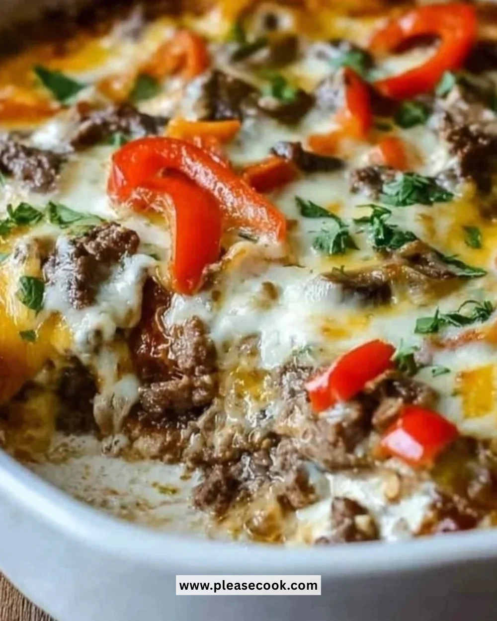 Low Carb Philly Cheesesteak Casserole with peppers and onions on a plate.