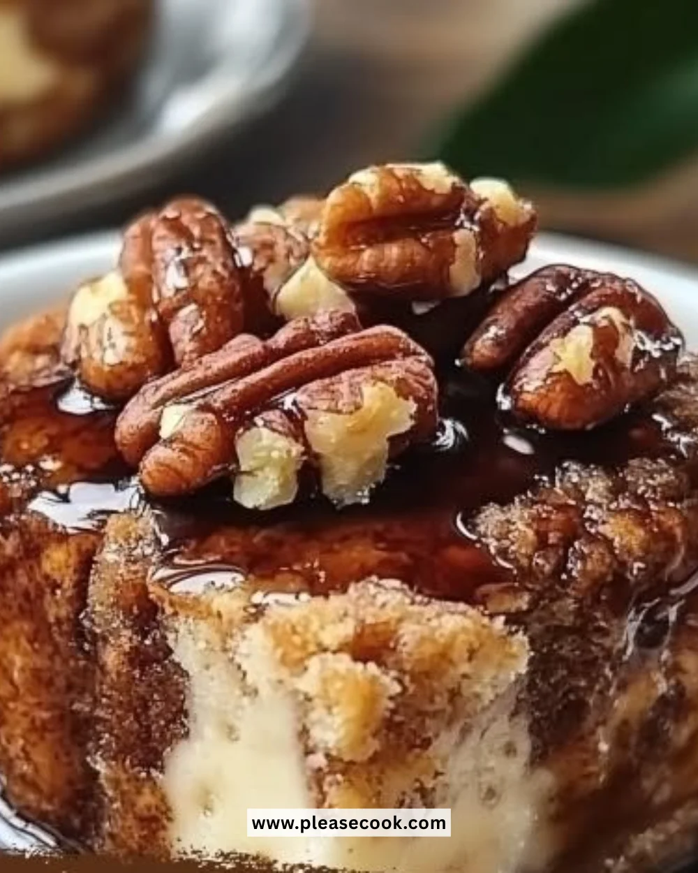 Pecan Bourbon Bread Pudding with caramel sauce and toasted pecans on top