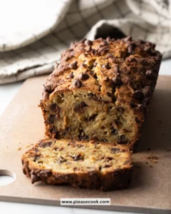 Deliciously moist Protein Banana Bread loaves served on a wooden board.