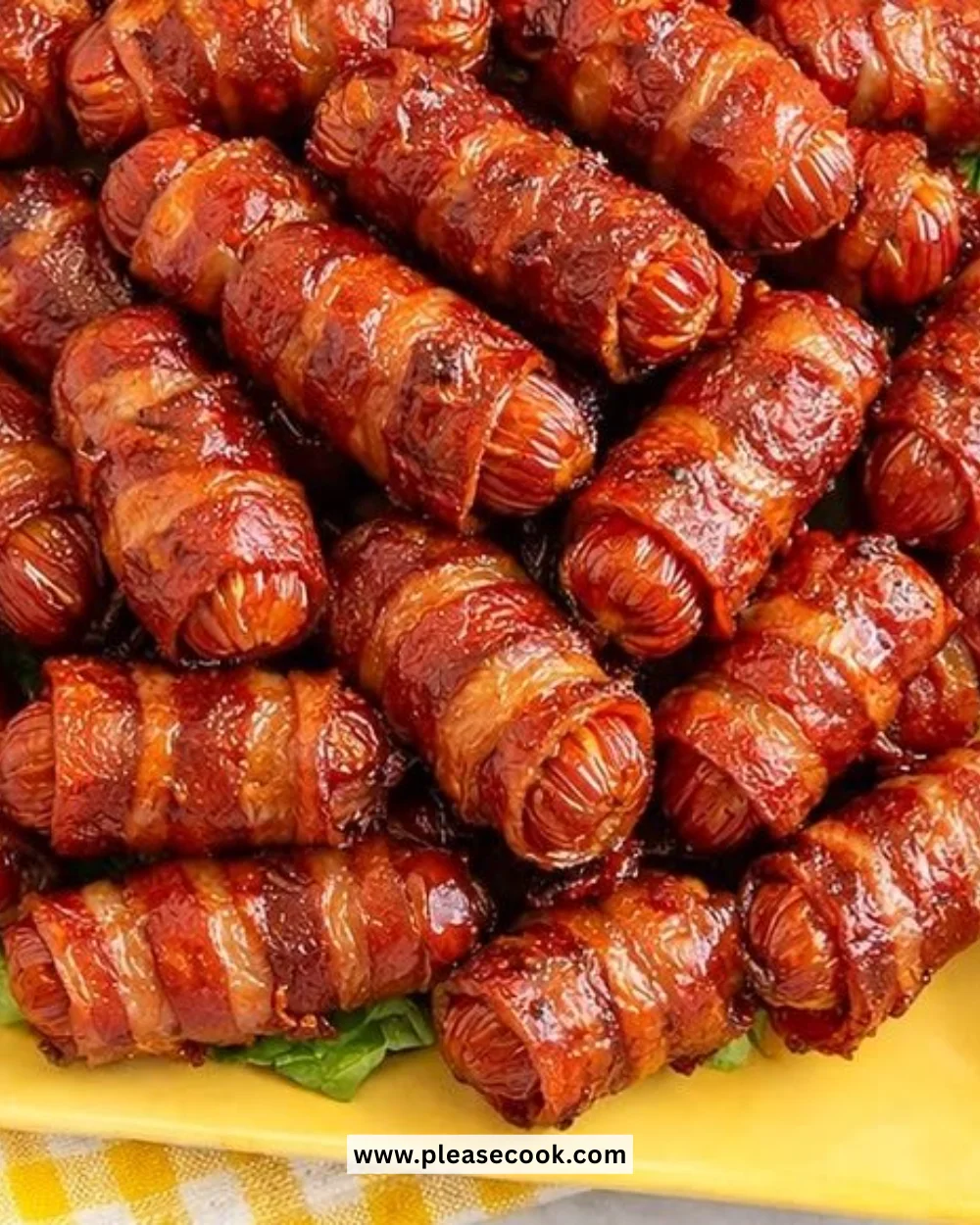 Delicious brown sugar bacon wrapped smokies served on a platter.
