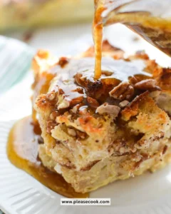 Deliciously baked sourdough bread pudding served in a bowl with caramel drizzle