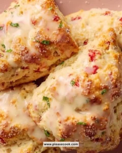Freshly baked strawberry mint scones on a plate