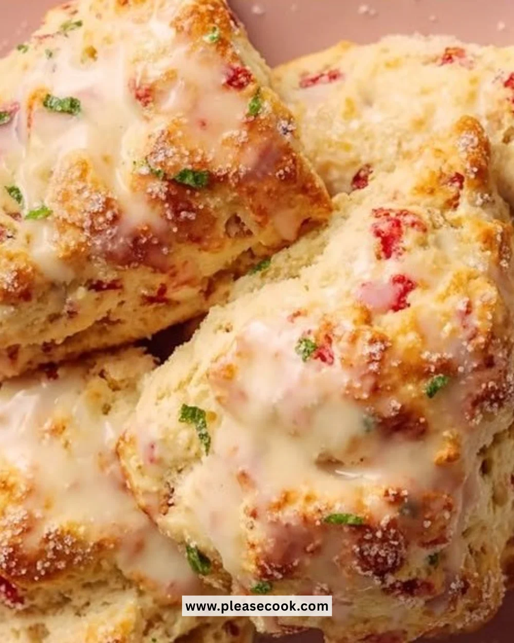 Freshly baked strawberry mint scones on a plate