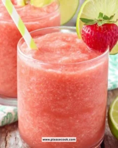 Delicious strawberry slushies with lime served in a glass