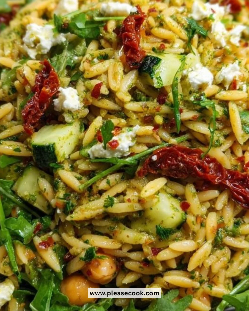 Delicious bowl of Sun Dried Tomato Orzo Pesto with fresh ingredients