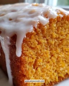 Slice of ultra-moist sweet potato pound cake on a plate with a fork