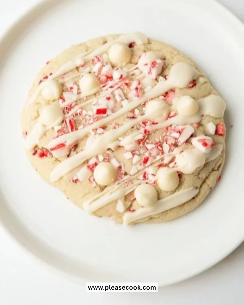 Delicious white chocolate peppermint bark sprinkled with candy cane bits.