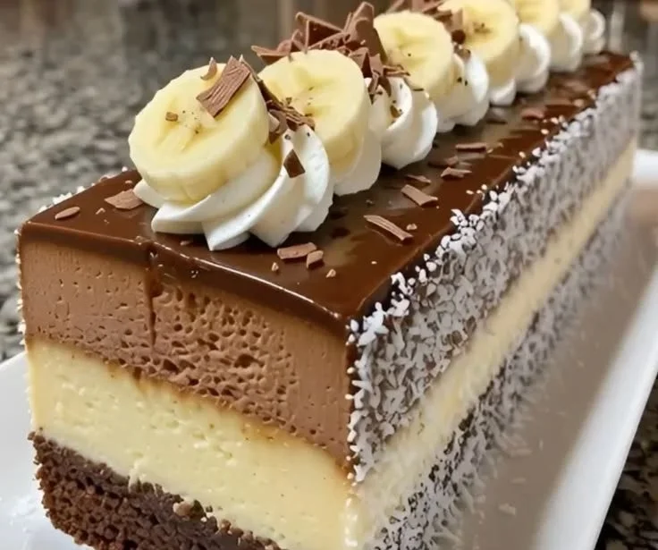 Delicious Banana Chocolate Mousse Cake topped with chocolate shavings