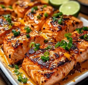 Bang Bang Salmon dish with creamy sauce and garnished vegetables