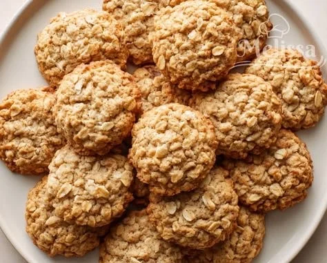 Delicious chewy banana oatmeal cookies on a baking sheet