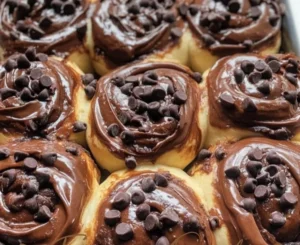 Delicious chocolate sweet rolls topped with chocolate glaze