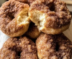 Freshly baked Cinnamon Crunch Sourdough Bagels with a sweet sugary topping.