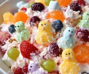 Colorful Easter Fruit Fluff Salad with whipped cream and mixed fruits