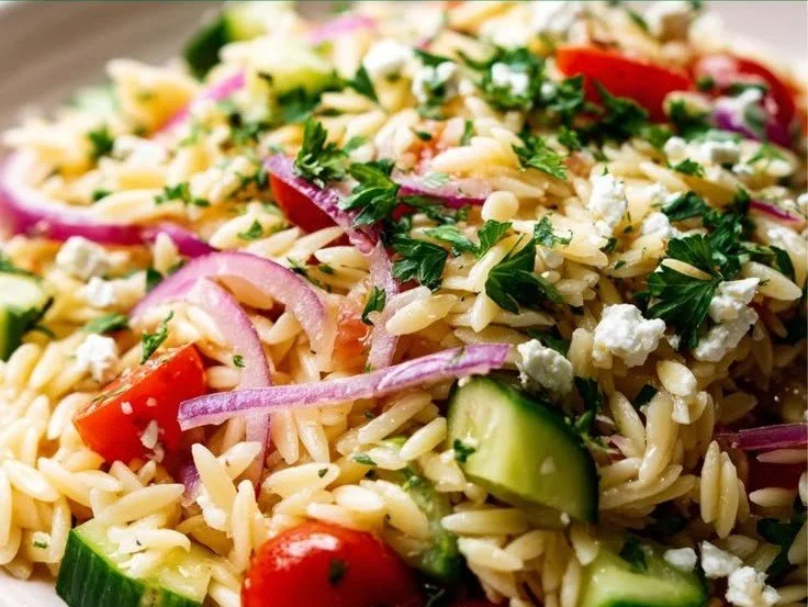 Greek Orzo Pasta Salad with fresh vegetables and feta cheese