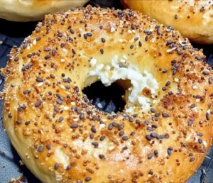 Protein bagels topped with cottage cheese and fresh ingredients