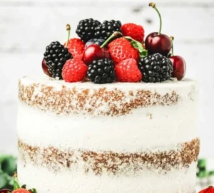 Delicious Berry Naked Cake with fresh fruit and cream frosting