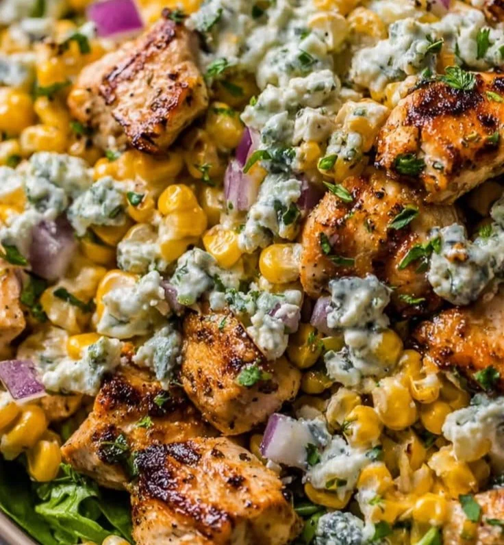 Delicious Chicken Street Corn Salad served in a bowl with vibrant ingredients.